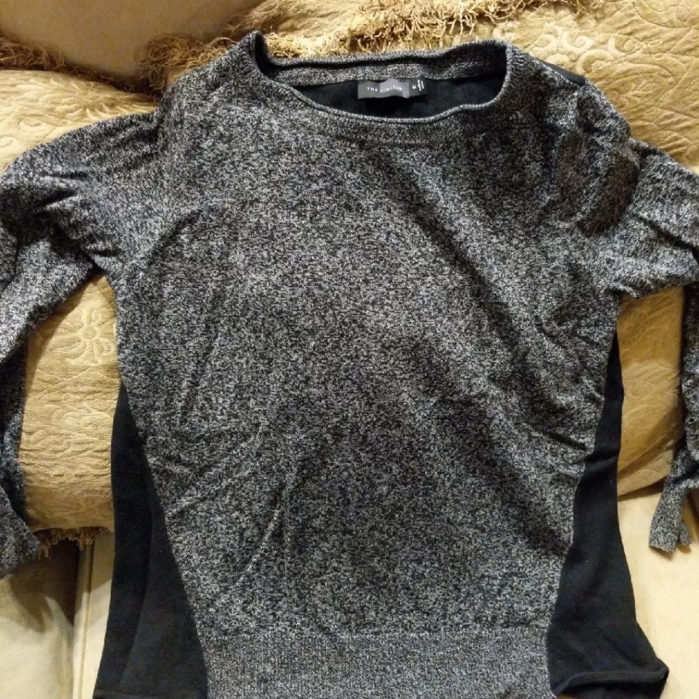 The limited medium gray and black sweater